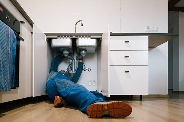 Professional Drain Cleaning technician working in Clarksburg, WV